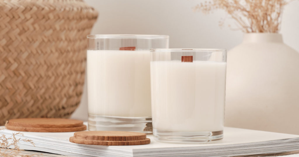 Handmade scented candles in a glass with a wooden lid. Soy wax candles with a wooden wick. 
