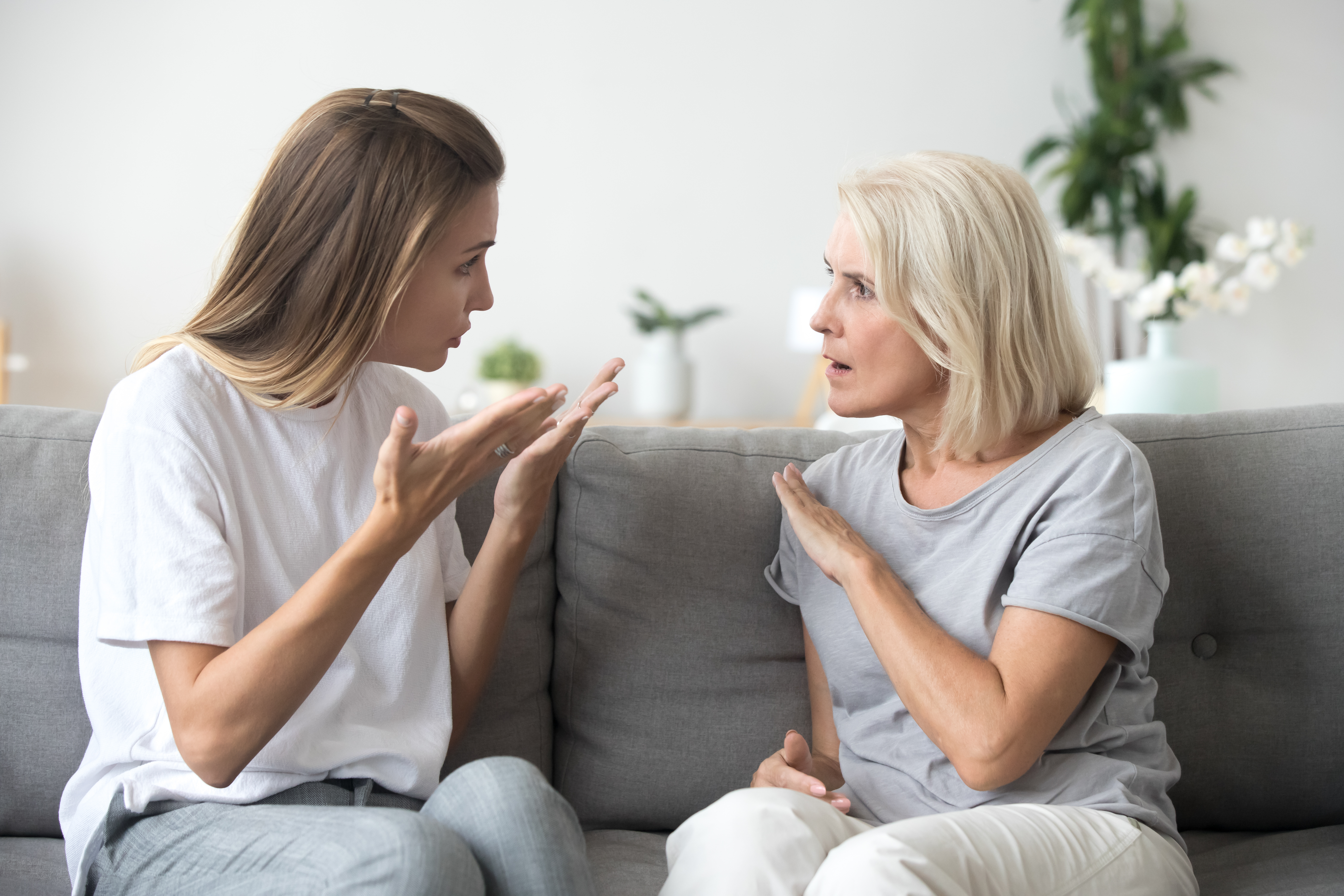 A young woman arguing with her senior mom | Source: Shutterstock