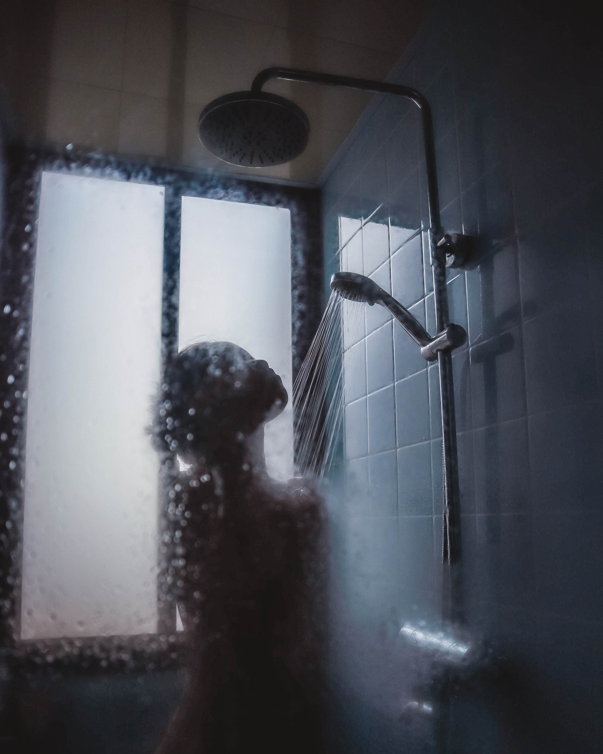 Person in shower | Source: Unsplash